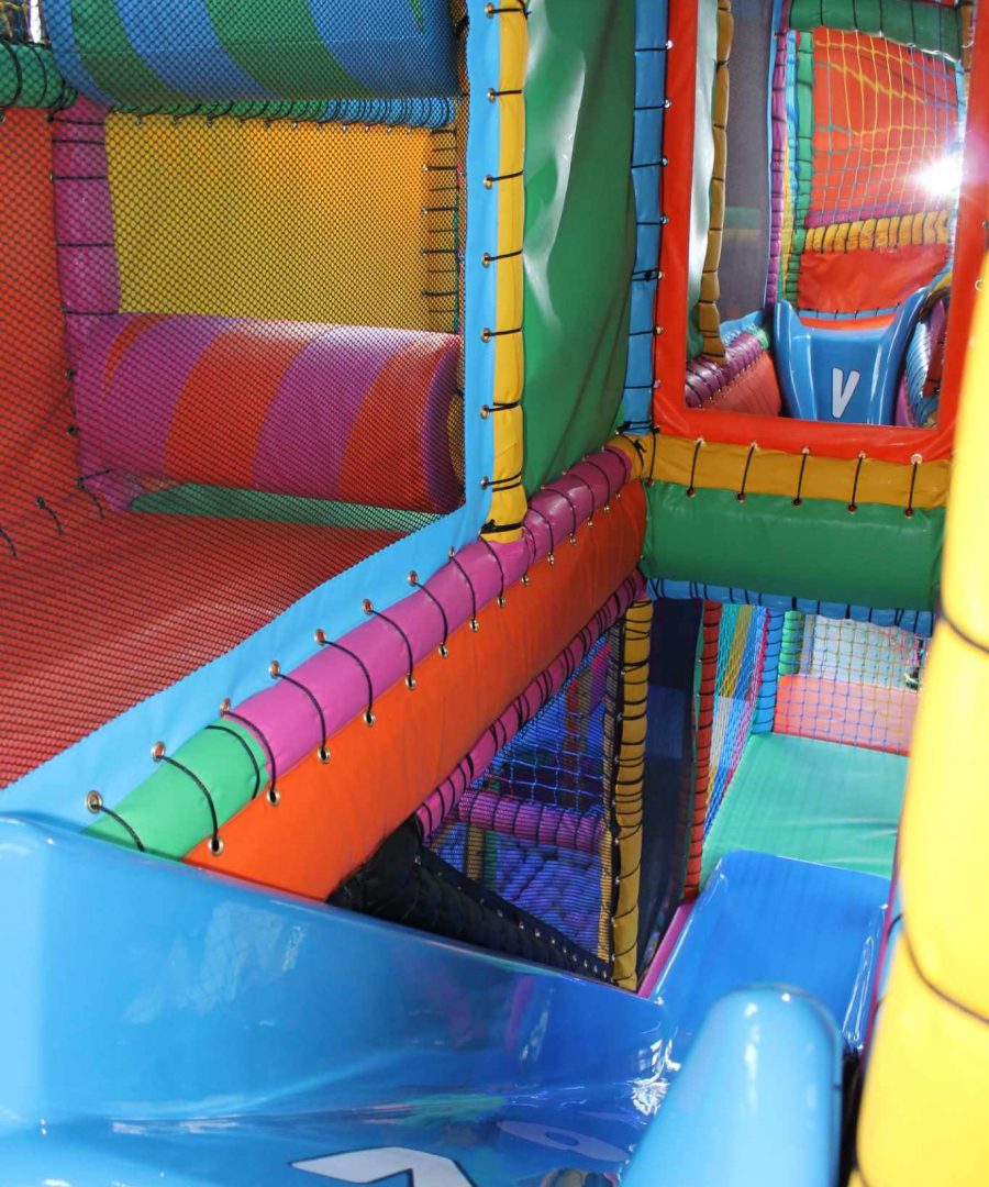 Inside VoJo's Playbus - Safe soft play area with ball pit and slide in London