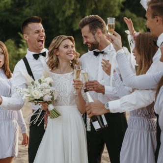 people-celebrating-wedding-beach